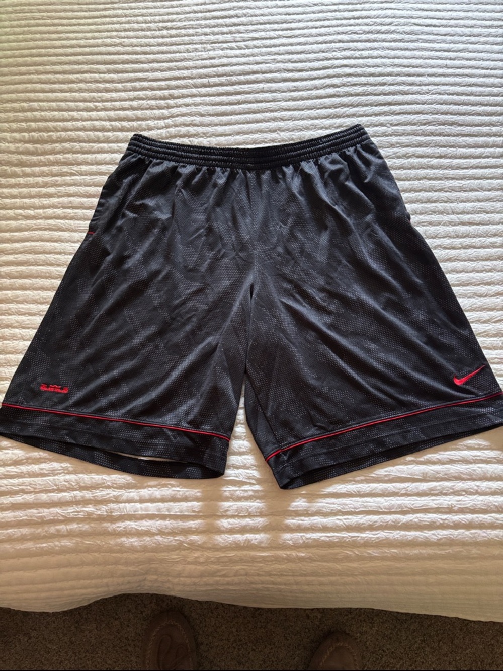 Nike Black Mesh Athletic Shorts with Red Accents